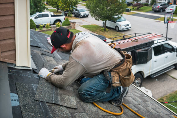 Professional Roofing technician working in Dedham, IA
